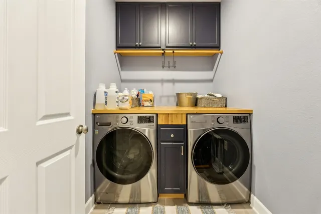 a room with lots of furniture and a wooden floor