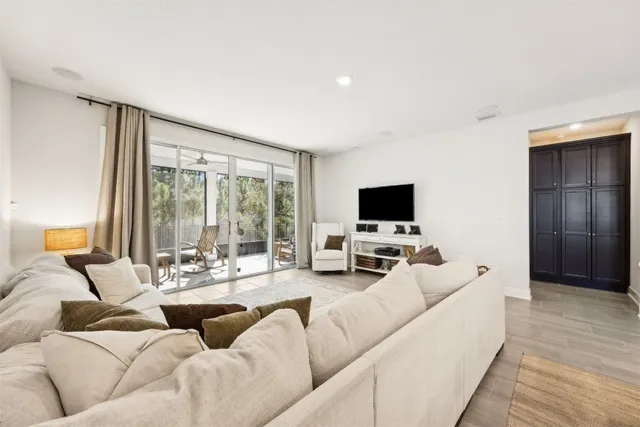 a balcony with chairs and with furniture