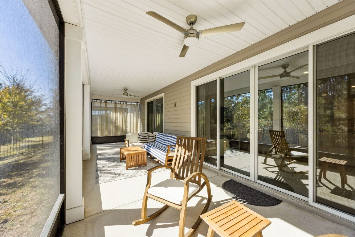 75968 Saffron Lane Yulee, FL 32097 - Photo 5 of 67 a balcony with chairs and with furniture