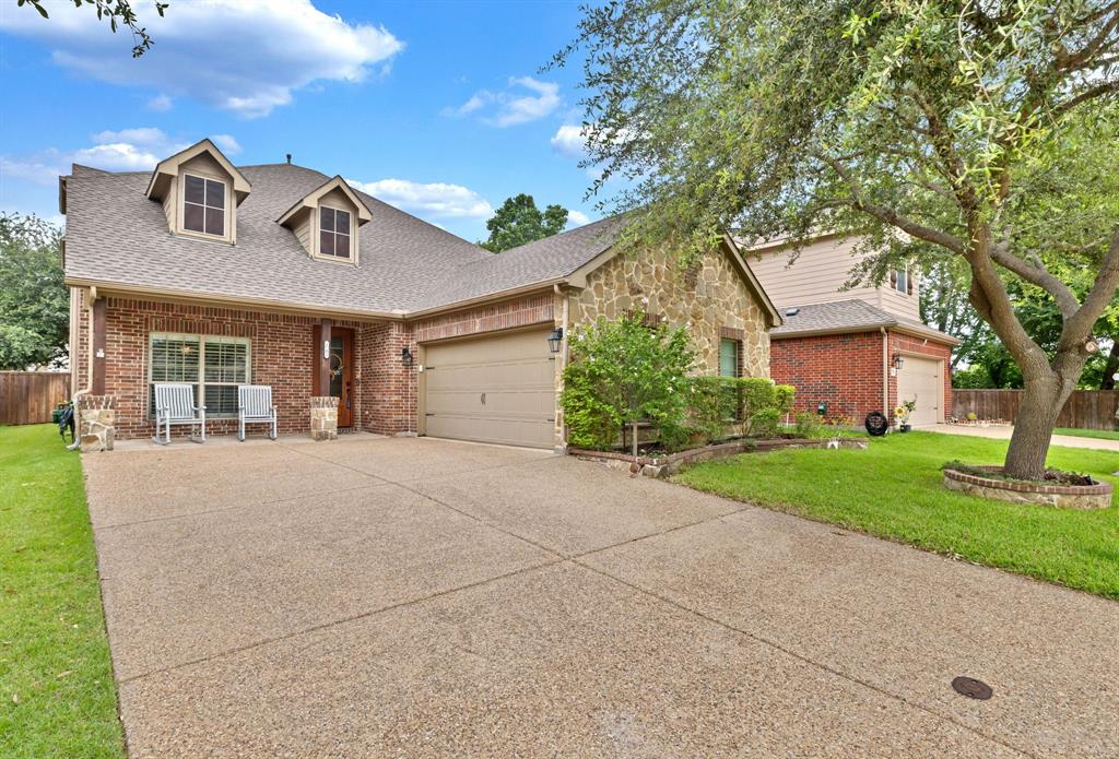 1701 Meadow Ranch Road McKinney, TX 75071 - Photo 2 of 40 front view of a house with a yard