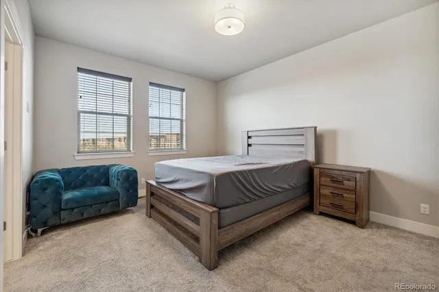 a bathroom with a shower and a glass door