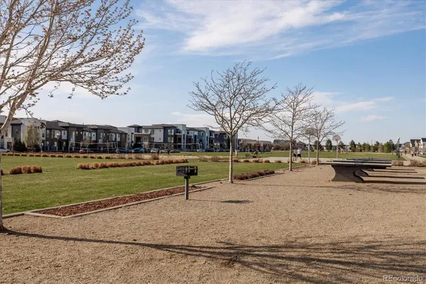 a front view of a house with parking space