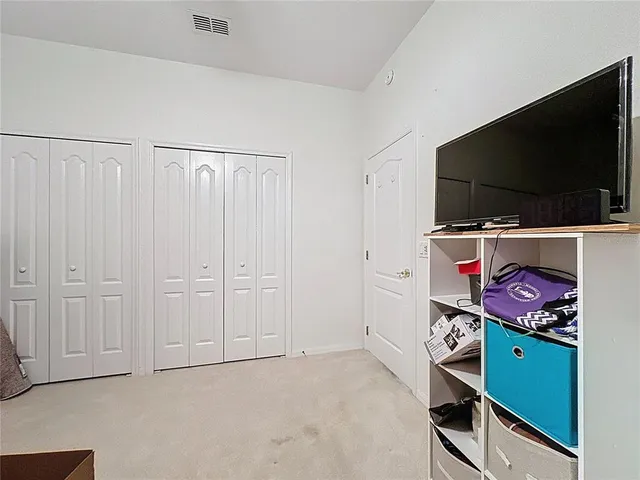 an aerial view of a house with yard swimming pool and outdoor seating