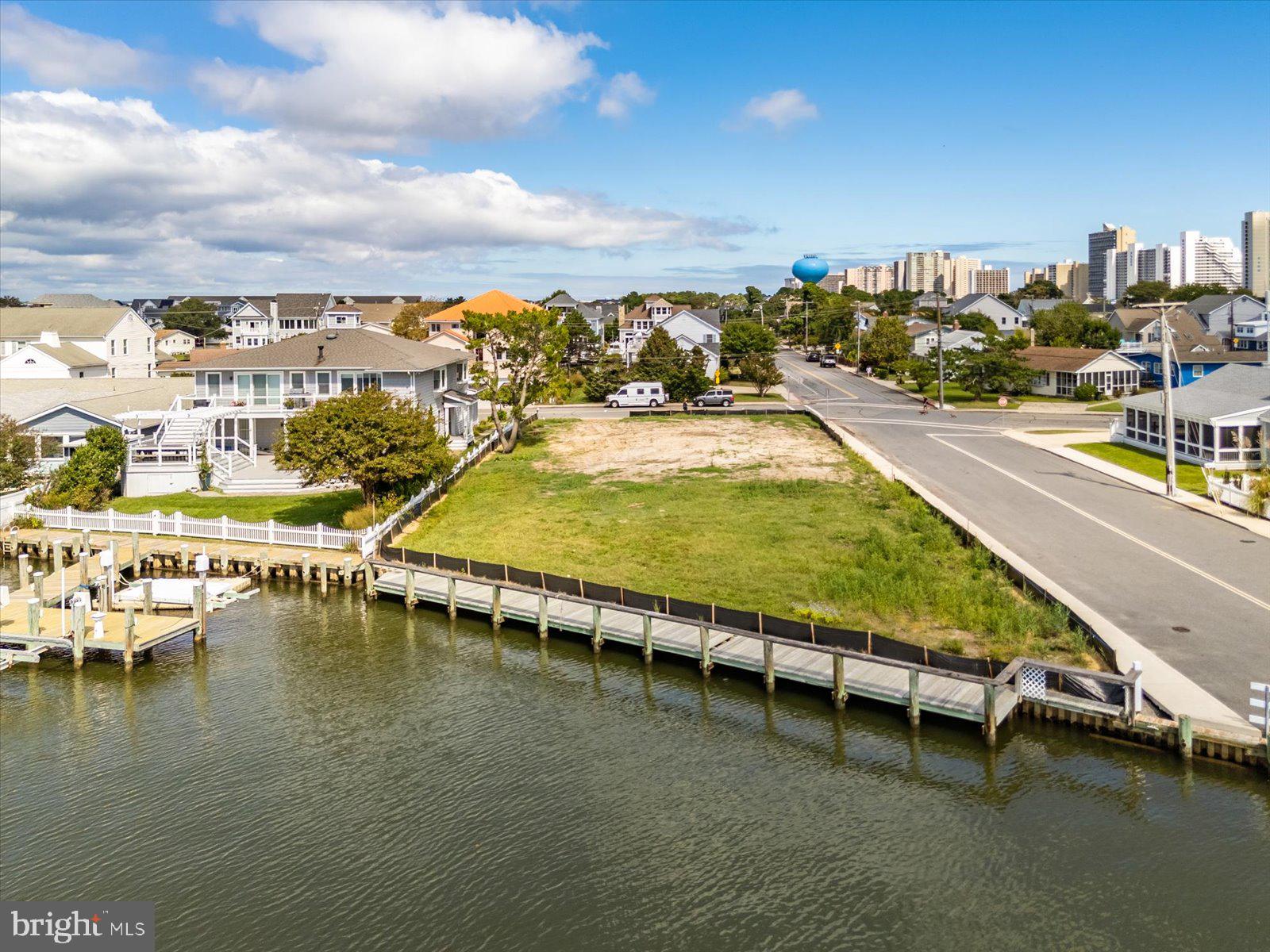 401 Bering Road Ocean City, MD 21842 - Photo 11 of 32 a view of a swimming pool with outdoor seating