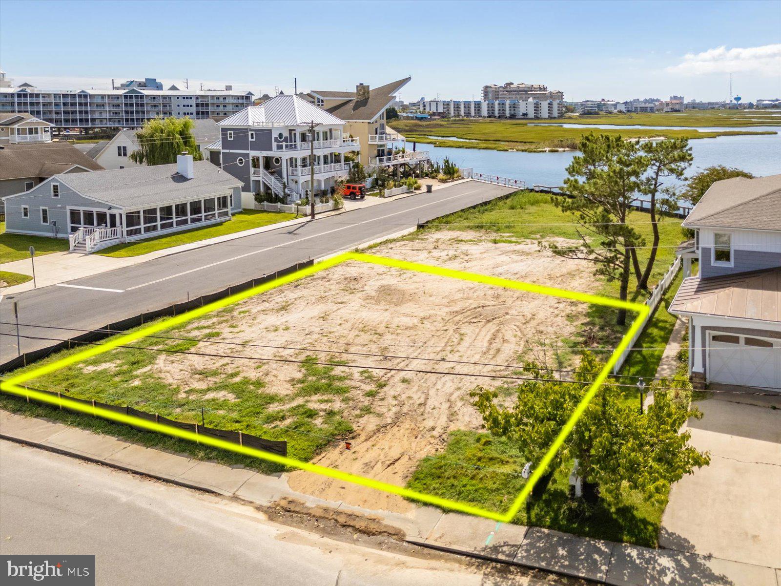 401 Bering Road Ocean City, MD 21842 - Photo 2 of 32 a view of a swimming pool with an ocean view