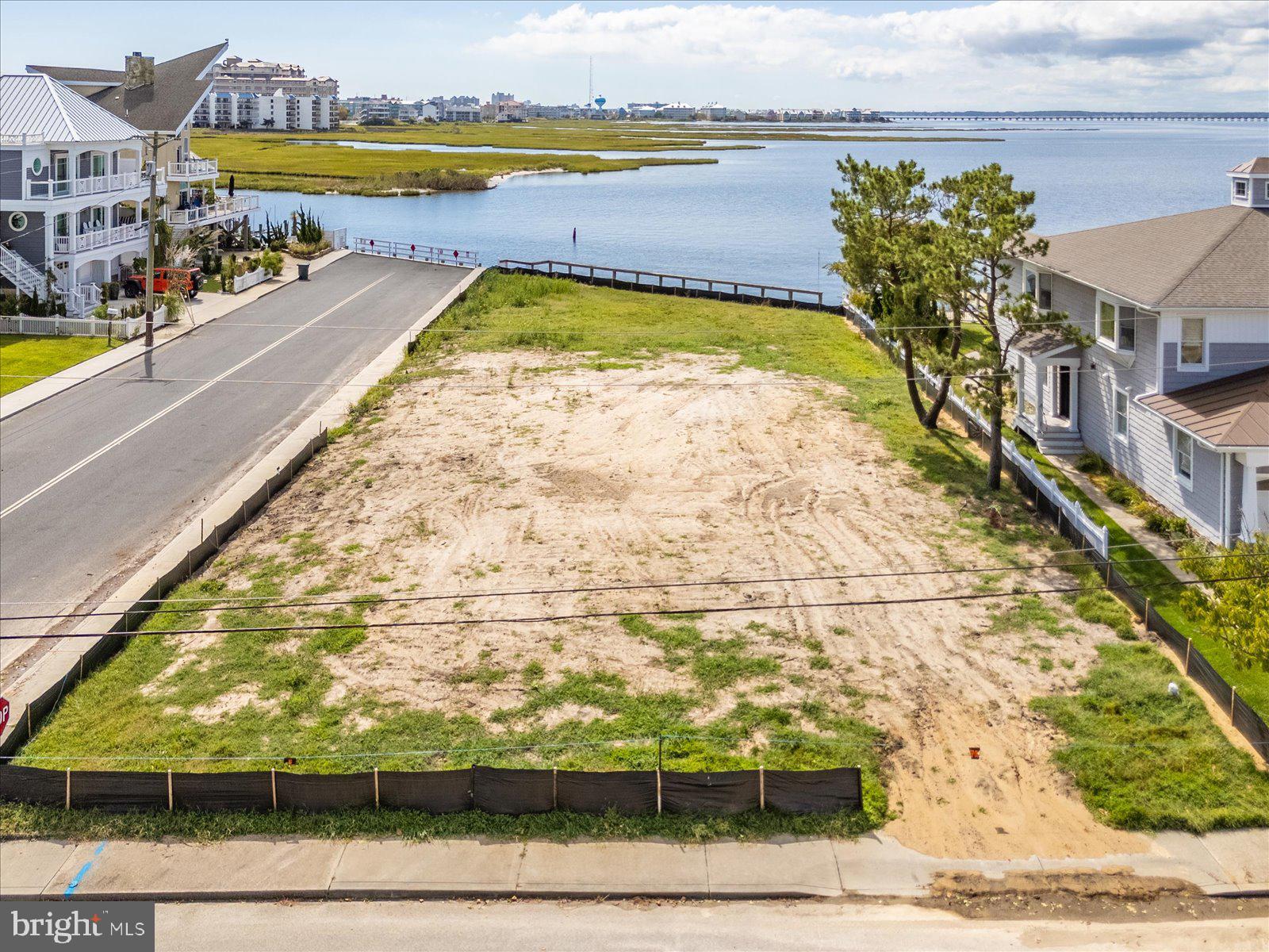 401 Bering Road Ocean City, MD 21842 - Photo 3 of 32 a view of swimming pool with outdoor seating and yard in the back