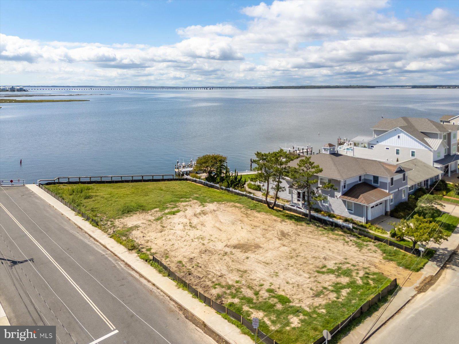 401 Bering Road Ocean City, MD 21842 - Photo 5 of 32 a view of a pool and an outdoor seating
