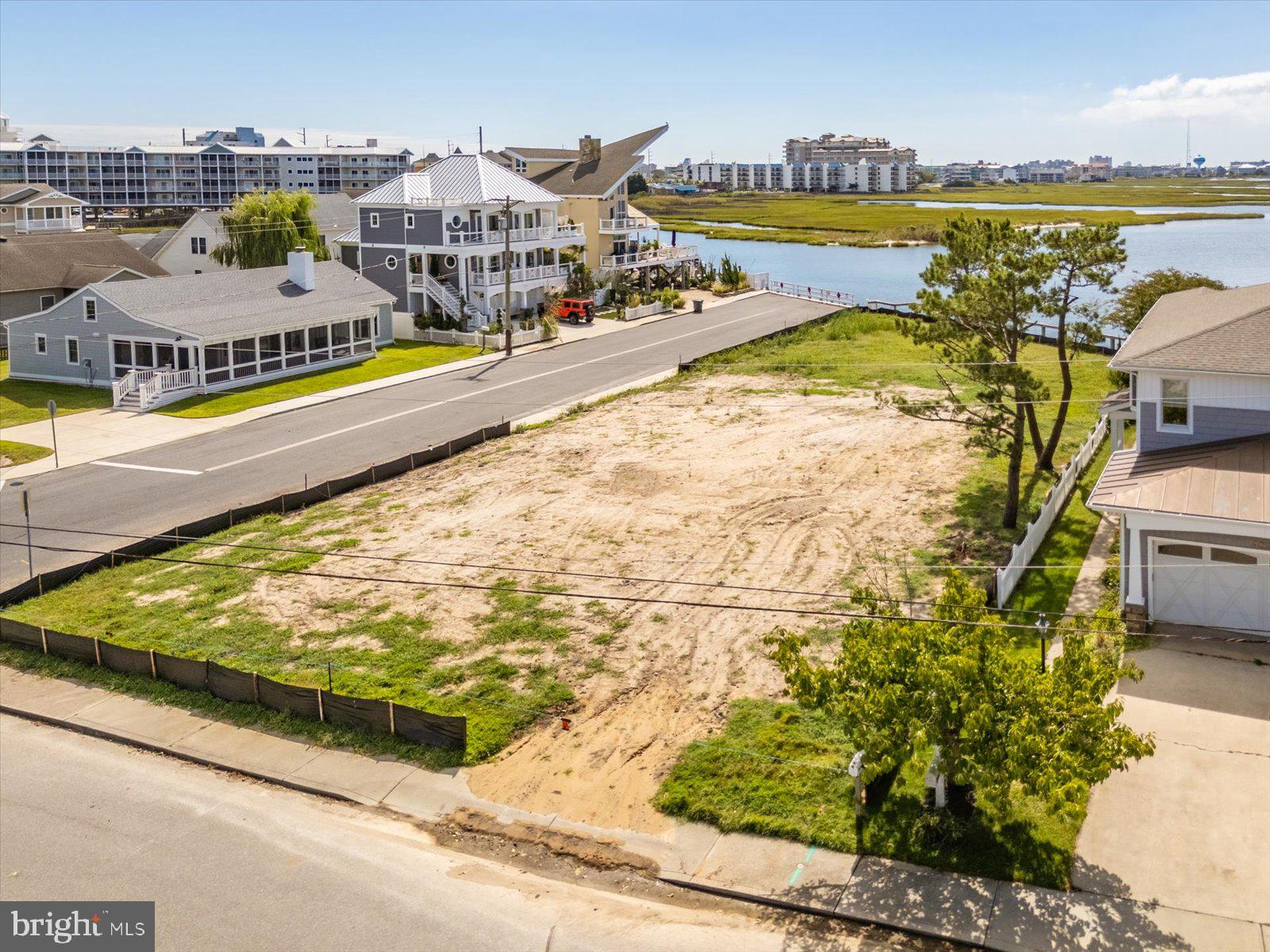 401 Bering Road Ocean City, MD 21842 - Photo 9 of 32 a view of a swimming pool with an ocean view