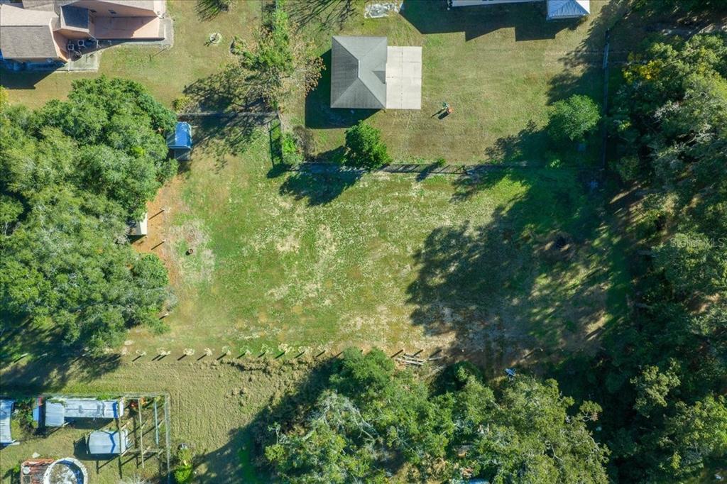 2026 Northeast 97th Street Road Anthony, FL 32617 - Photo 12 of 20 an aerial view of residential houses with outdoor space
