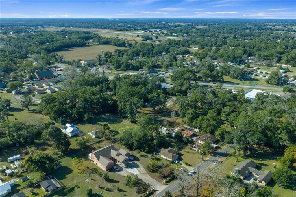 2026 Northeast 97th Street Road Anthony, FL 32617 - Photo 17 of 20 an aerial view of a town with trees