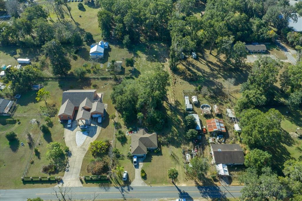 2026 Northeast 97th Street Road Anthony, FL 32617 - Photo 19 of 20 an aerial view of house with yard