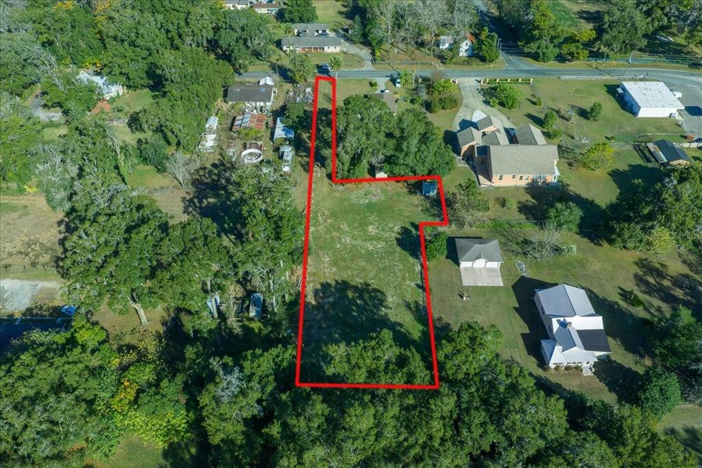 2026 Northeast 97th Street Road Anthony, FL 32617 - Photo 3 of 20 an aerial view of a house with a yard