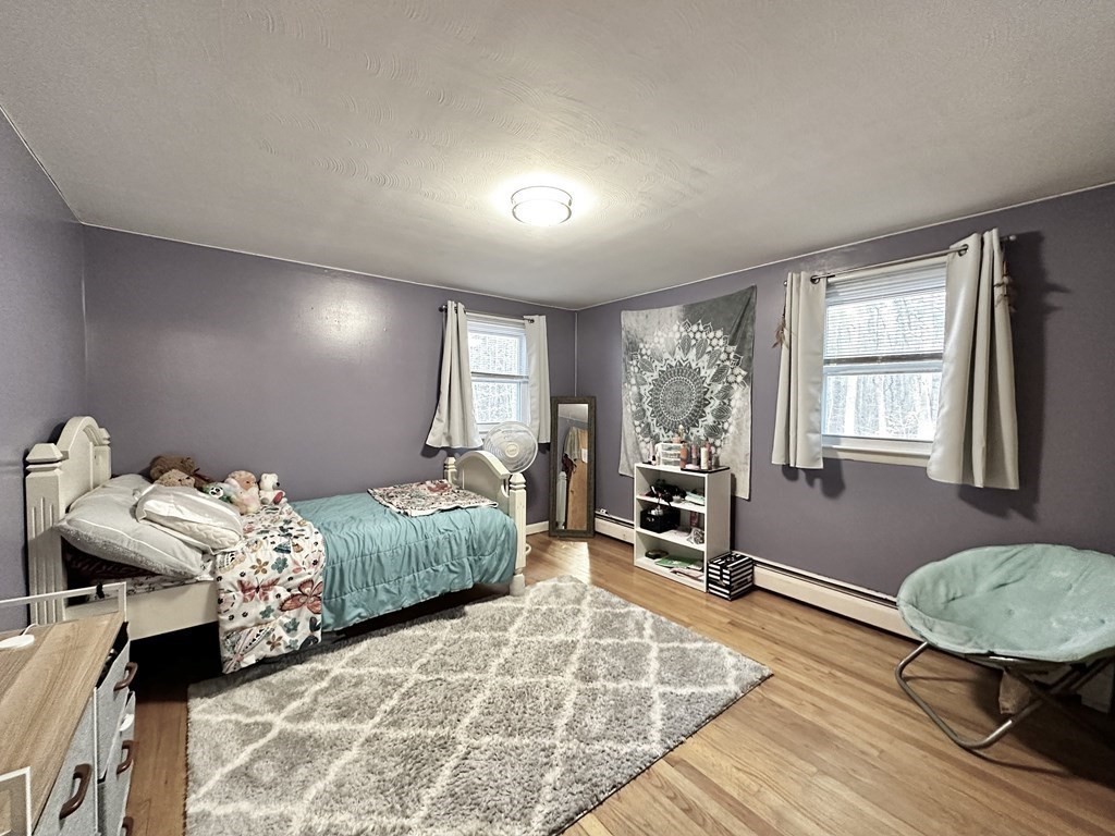 174 Chudy Street Three Rivers, MA 01080 - Photo 6 of 31 a bedroom with furniture and a window