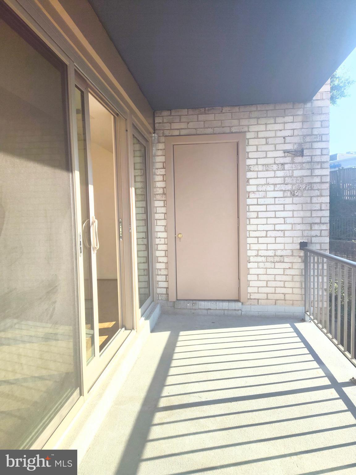 2515 Baltimore Road, Unit 25153 Rockville, MD 20853 - Photo 23 of 25 a view of a balcony with a door