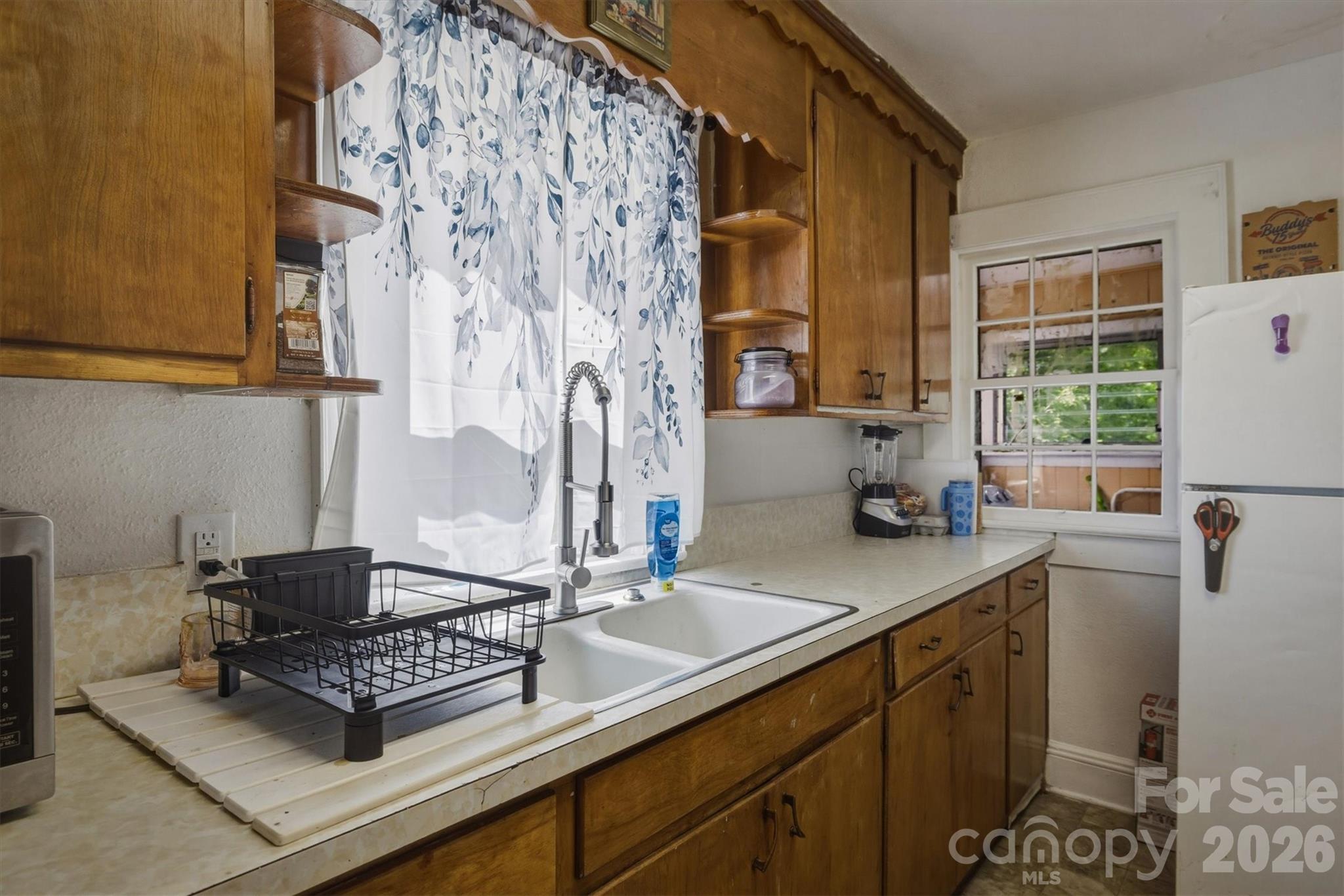 117 3rd Avenue Southwest Hickory, NC 28602 - Photo 13 of 21 a kitchen with stainless steel appliances granite countertop a sink stove and cabinets
