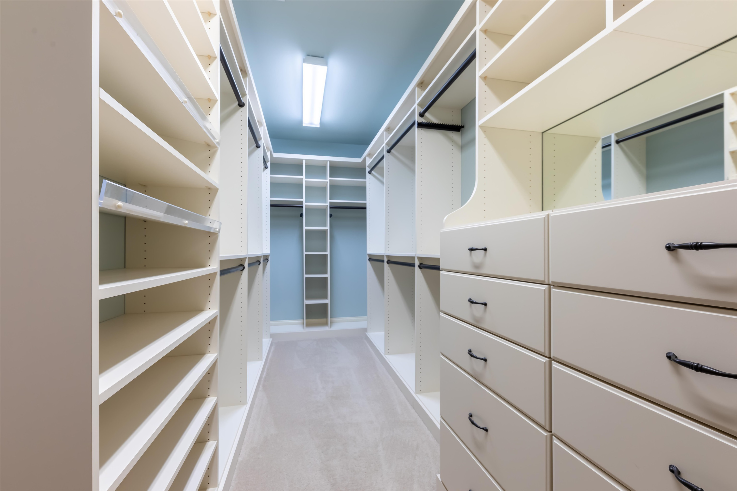 9805 Najma Street Raleigh, NC 27613 - Photo 20 of 30 Custom closet organizers maximize the space in the huge walk in closet. Closet