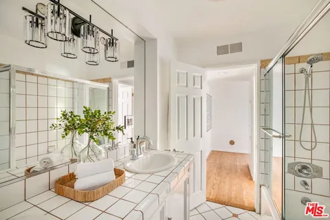 $2,698,000 | 1220 North Norman Place, Los Angeles, CA 90049
