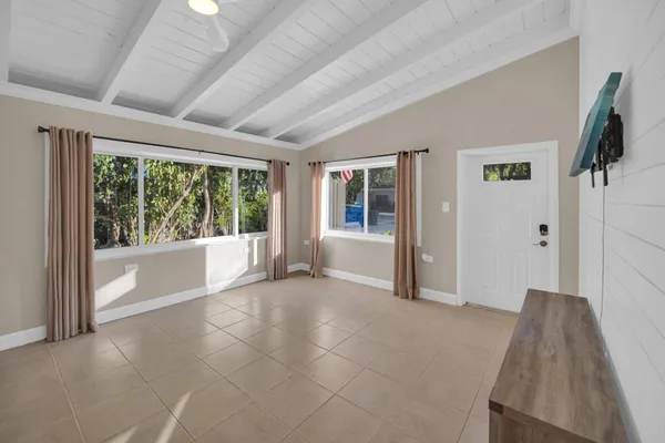 a view of empty room with front door
