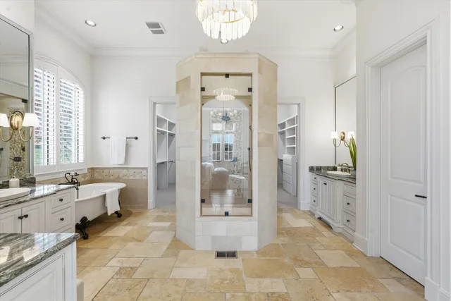 a large kitchen with stainless steel appliances granite countertop a stove and a sink