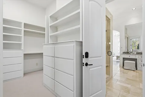 a view of a livingroom with furniture and staircase