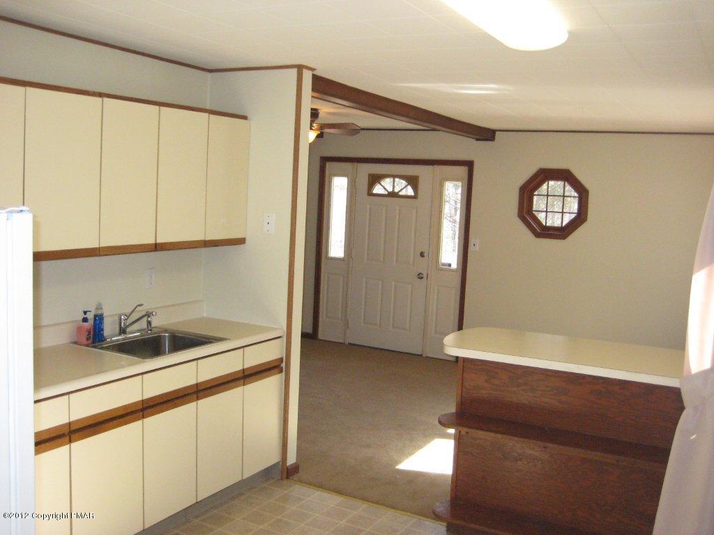 105 Westbrook Road Effort, PA 18330 - Photo 3 of 12 a kitchen with a sink and a cabinets