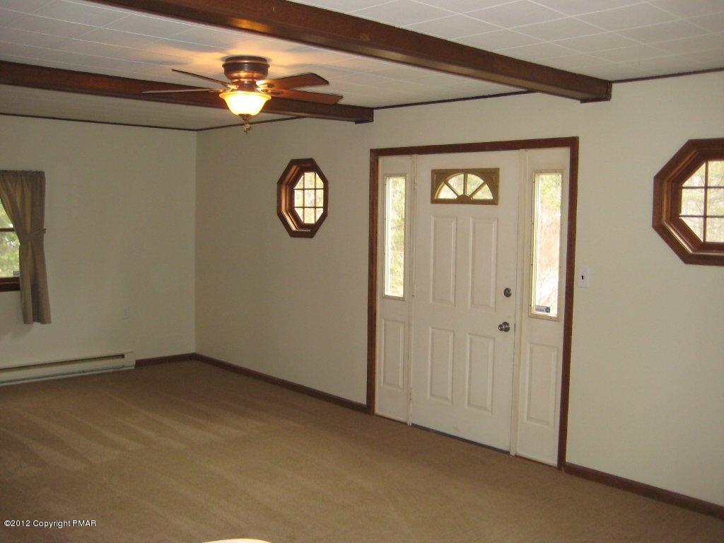105 Westbrook Road Effort, PA 18330 - Photo 4 of 12 a view of an empty room with a window