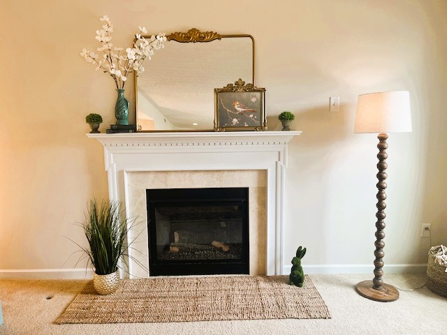 1978 Spring Ridge Drive Xenia, OH 45385 - Photo 16 of 44 This inviting living space features a cozy fireplace, perfect for relaxation and gatherings.