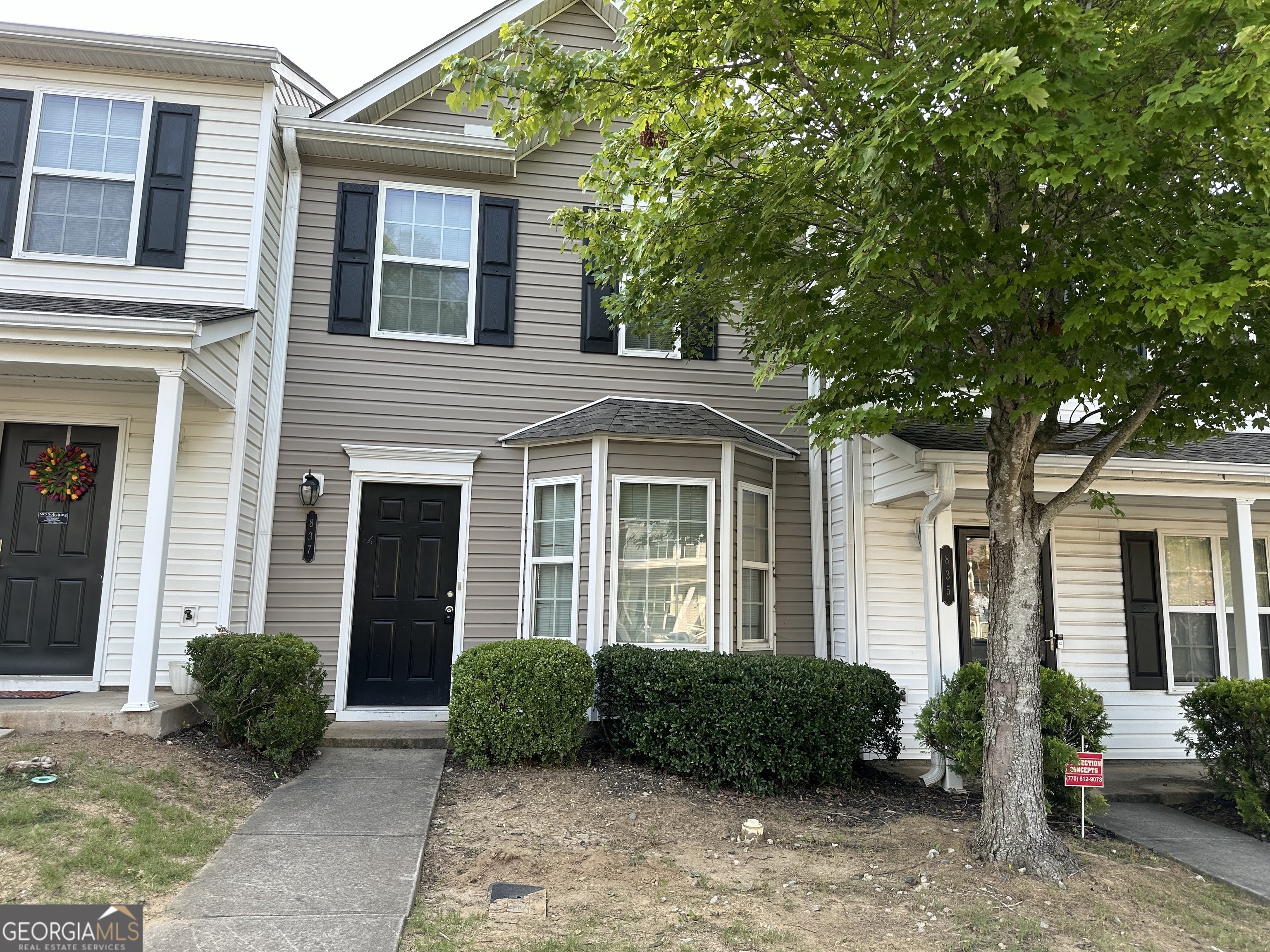 837 Crestwell Circle Atlanta, GA 30331 - Photo 1 of 1 a front view of a house with garden