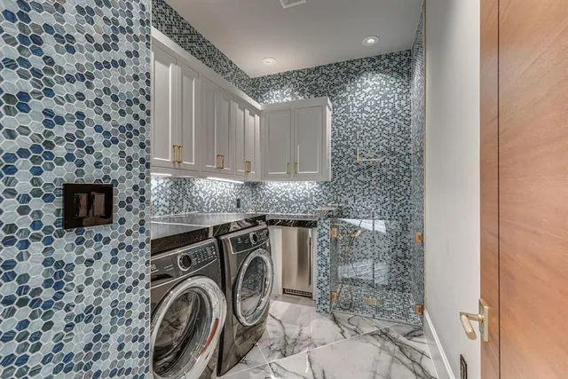 a bathroom with a sink and a shower