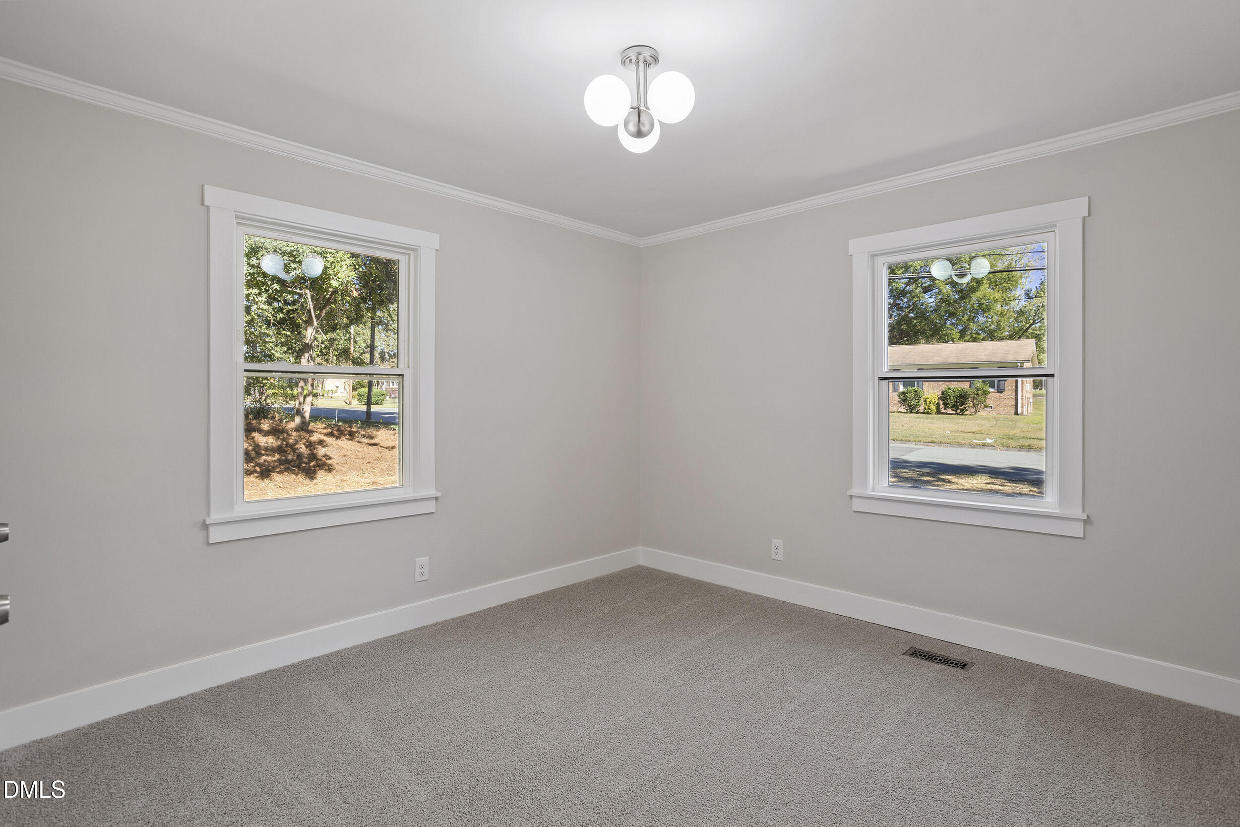 1311 Castlebay Road Durham, NC 27704 - Photo 20 of 39 a view of an empty room with a window