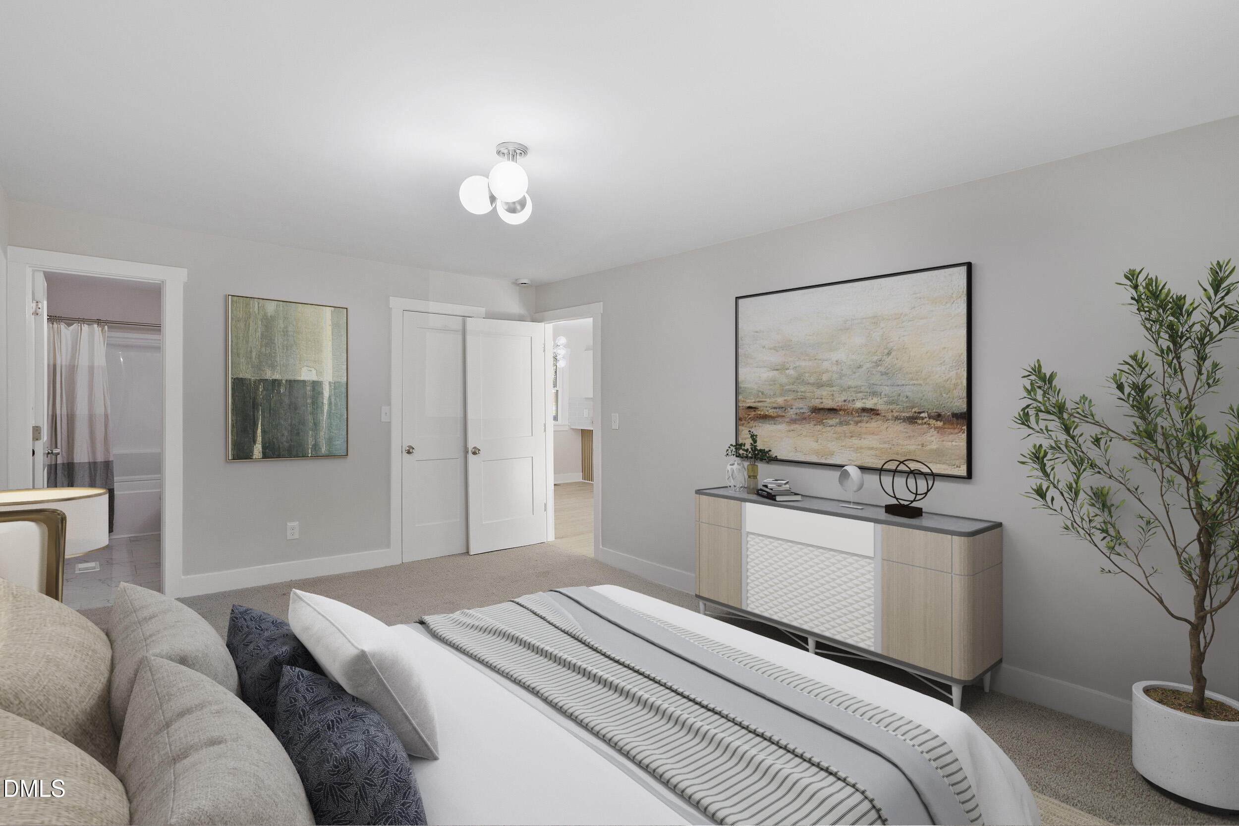 1311 Castlebay Road Durham, NC 27704 - Photo 7 of 39 a bedroom with a bed and a chandelier