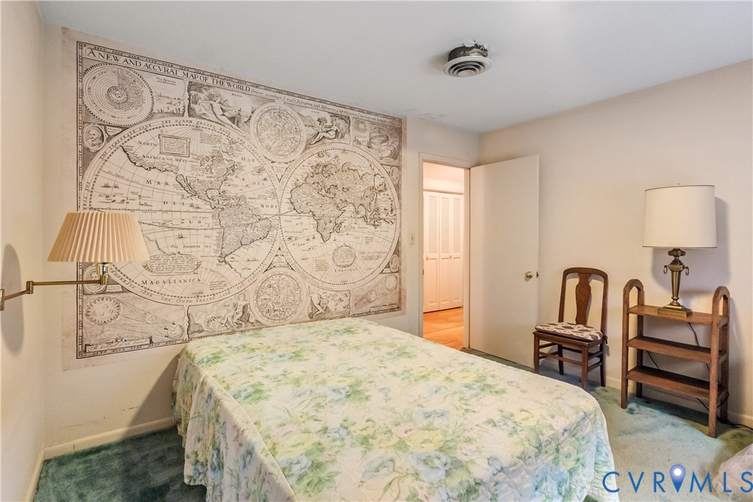2086 Defense Road Petersburg, VA 23805 - Photo 18 of 32 Carpeted bedroom featuring baseboards