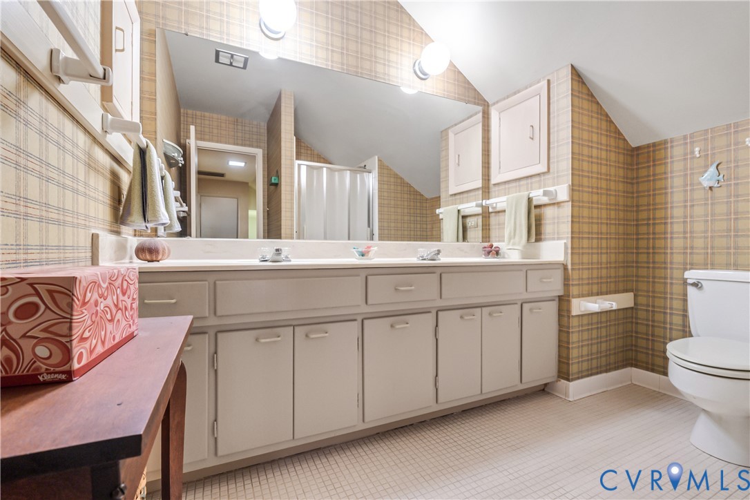 2086 Defense Road Petersburg, VA 23805 - Photo 20 of 32 Full bath featuring wallpapered walls, a stall sho