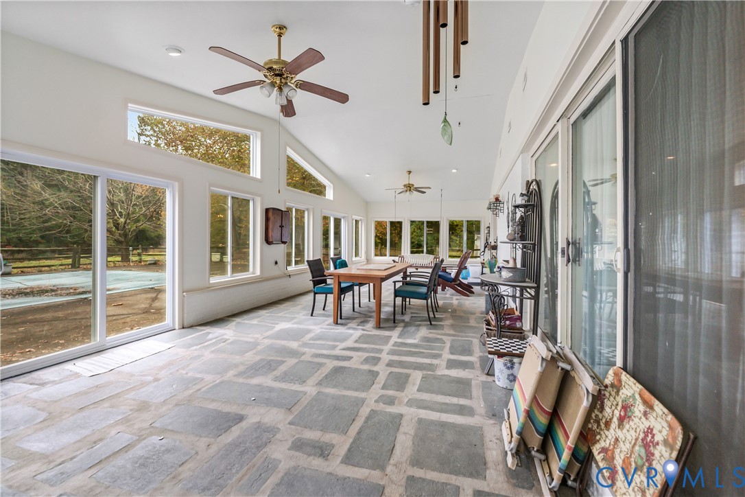 2086 Defense Road Petersburg, VA 23805 - Photo 31 of 32 Sunroom / solarium featuring high vaulted ceiling,