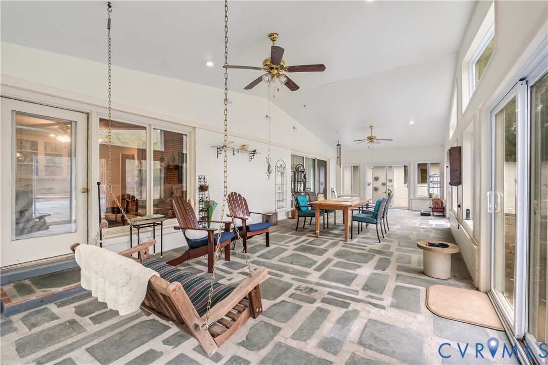 2086 Defense Road Petersburg, VA 23805 - Photo 5 of 32 View of patio featuring outdoor dining space, ceil