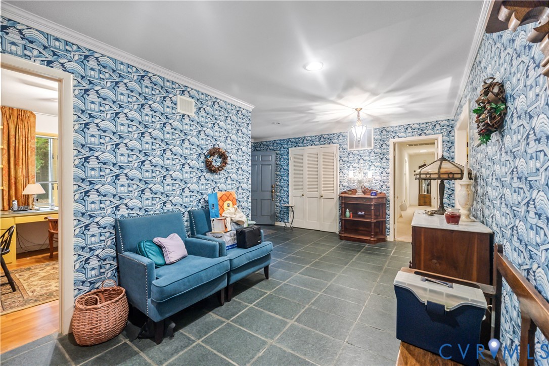 2086 Defense Road Petersburg, VA 23805 - Photo 7 of 32 Tiled living area with ornamental molding and wall