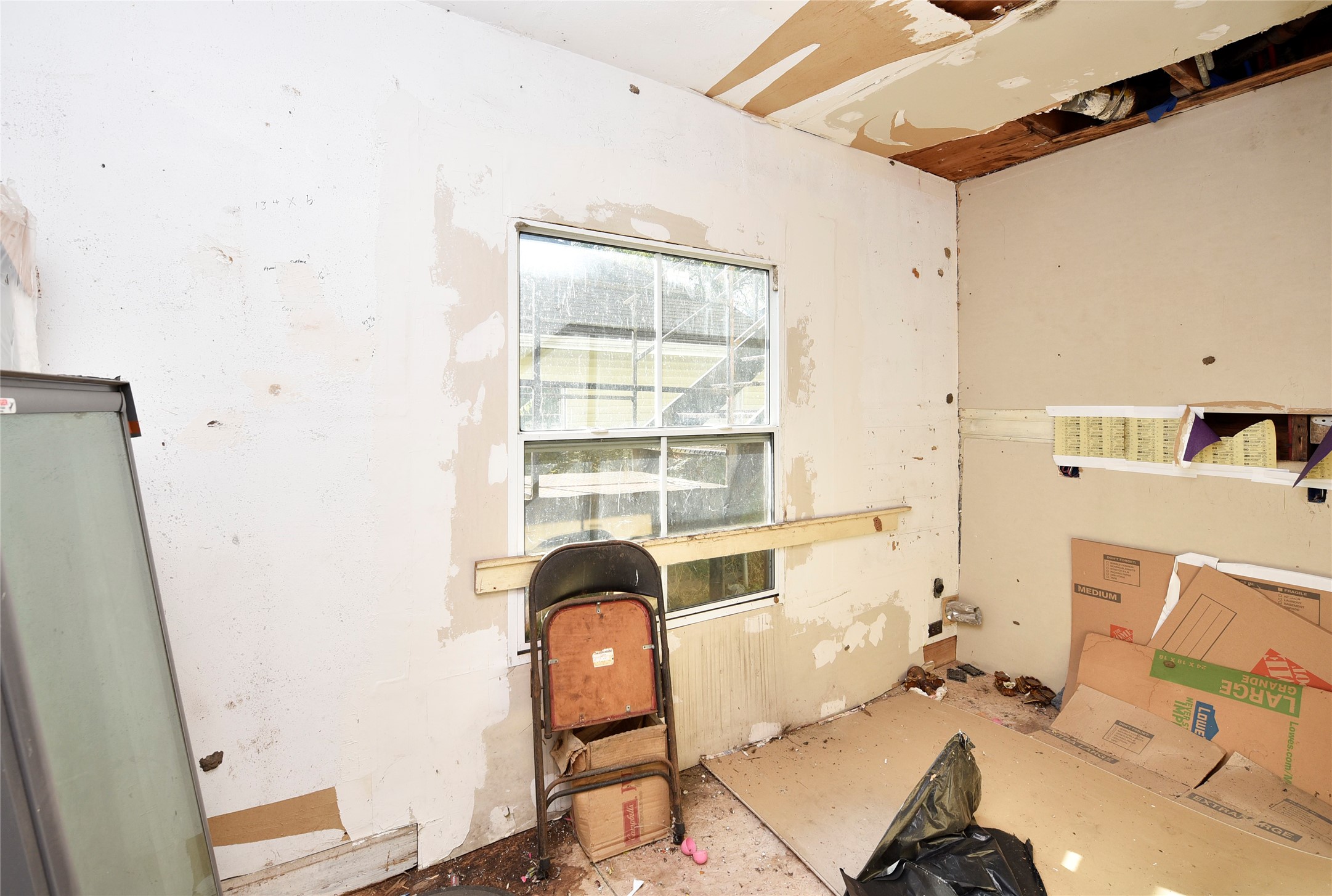 908 6th Street Rosenberg, TX 77471 - Photo 24 of 34 a view of a workspace with furniture and a window