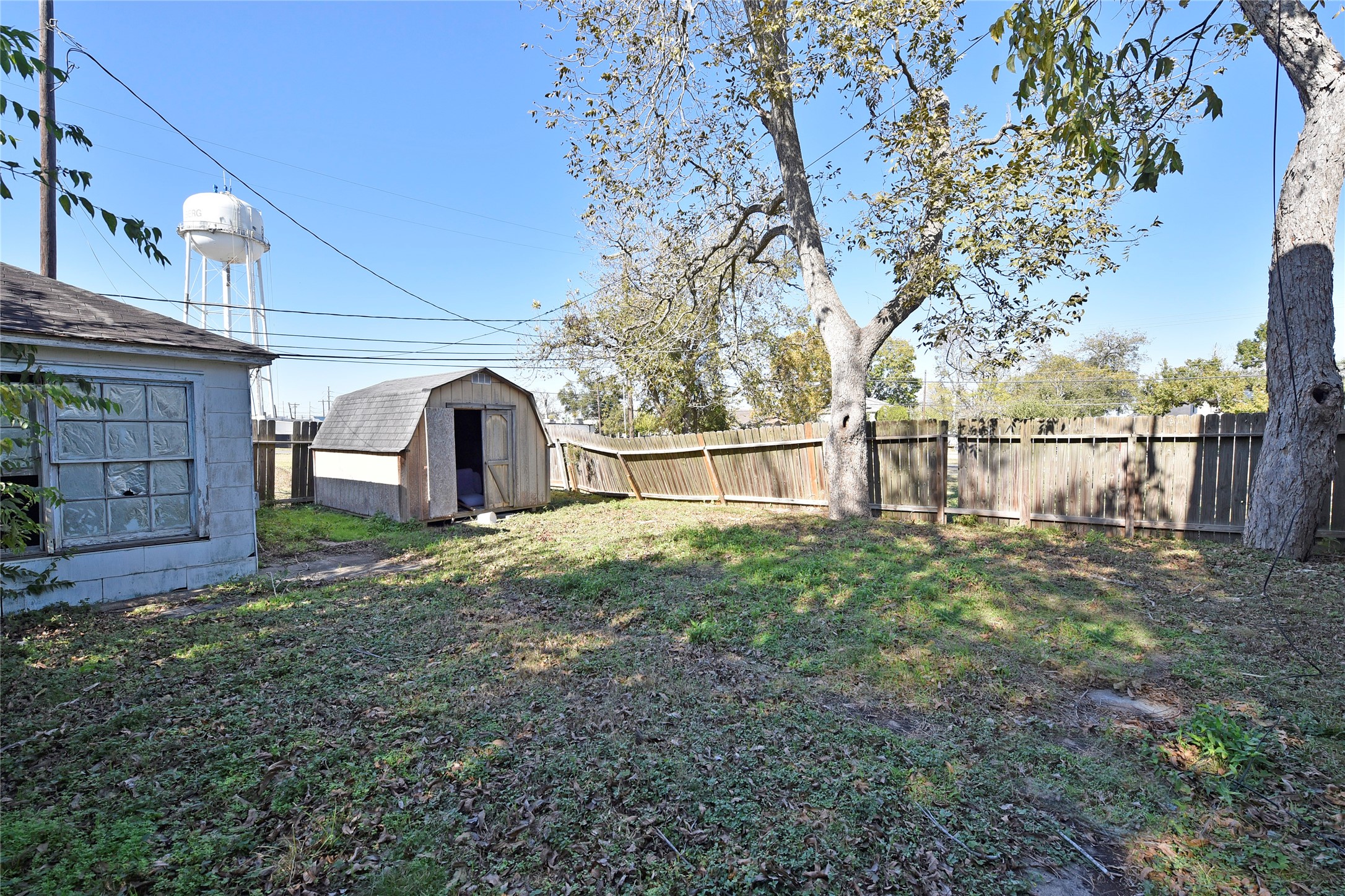 908 6th Street Rosenberg, TX 77471 - Photo 32 of 34 a view of a backyard