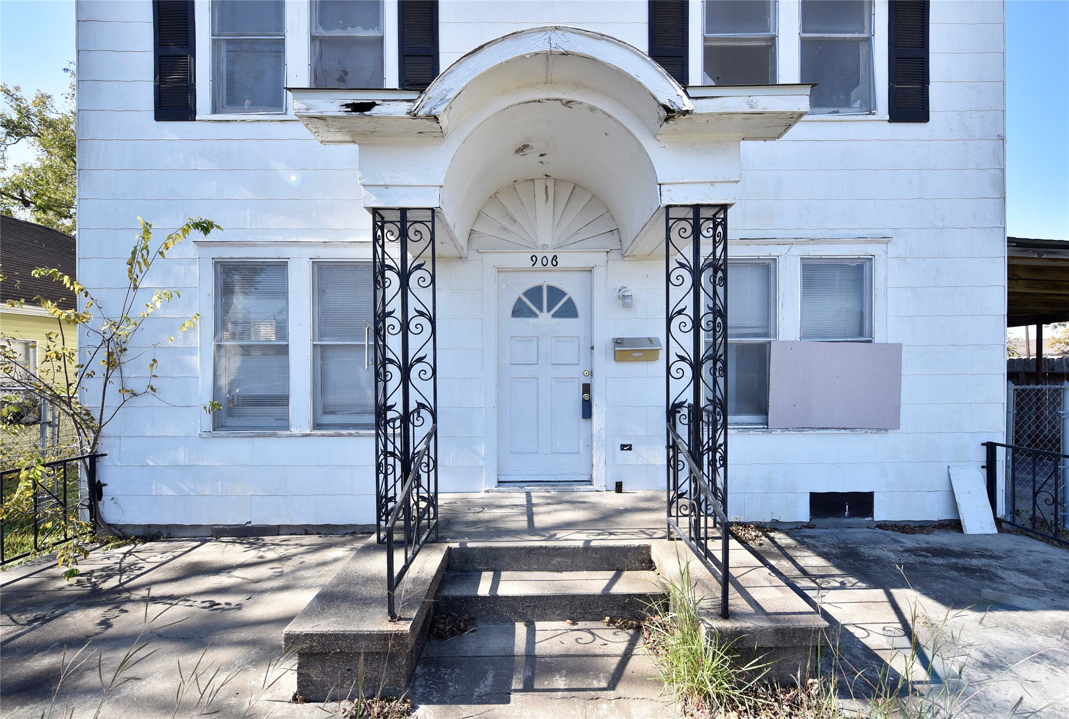 908 6th Street Rosenberg, TX 77471 - Photo 5 of 34 a large building with a clock on the door