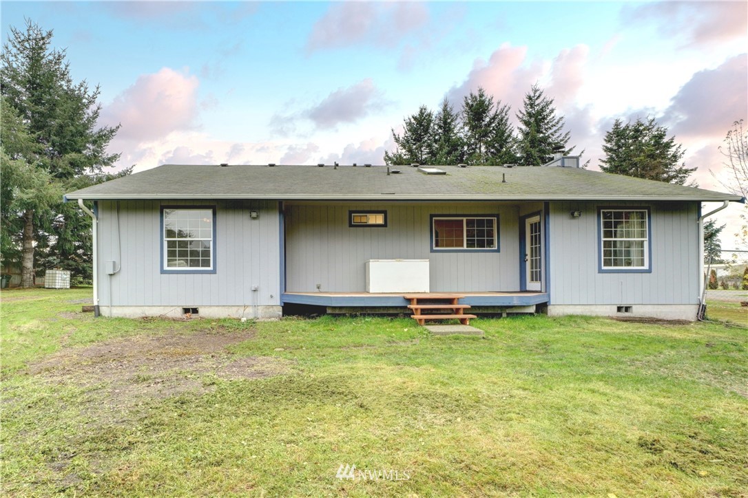 18818 Loganberry Street Southwest Rochester, WA 98579 - Photo 22 of 38 a house that has a big yard