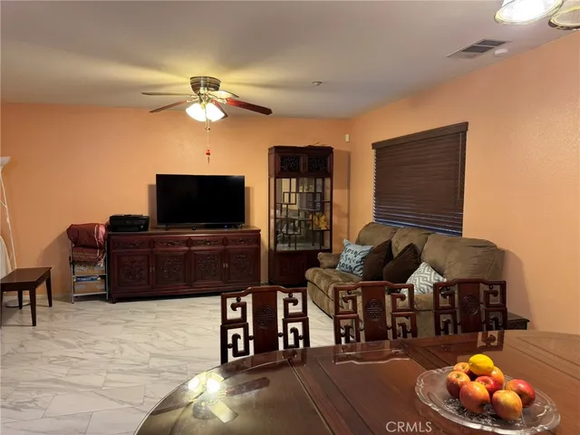 a view of a livingroom with furniture