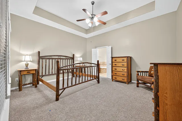 a view of livingroom with furniture and a chandelier