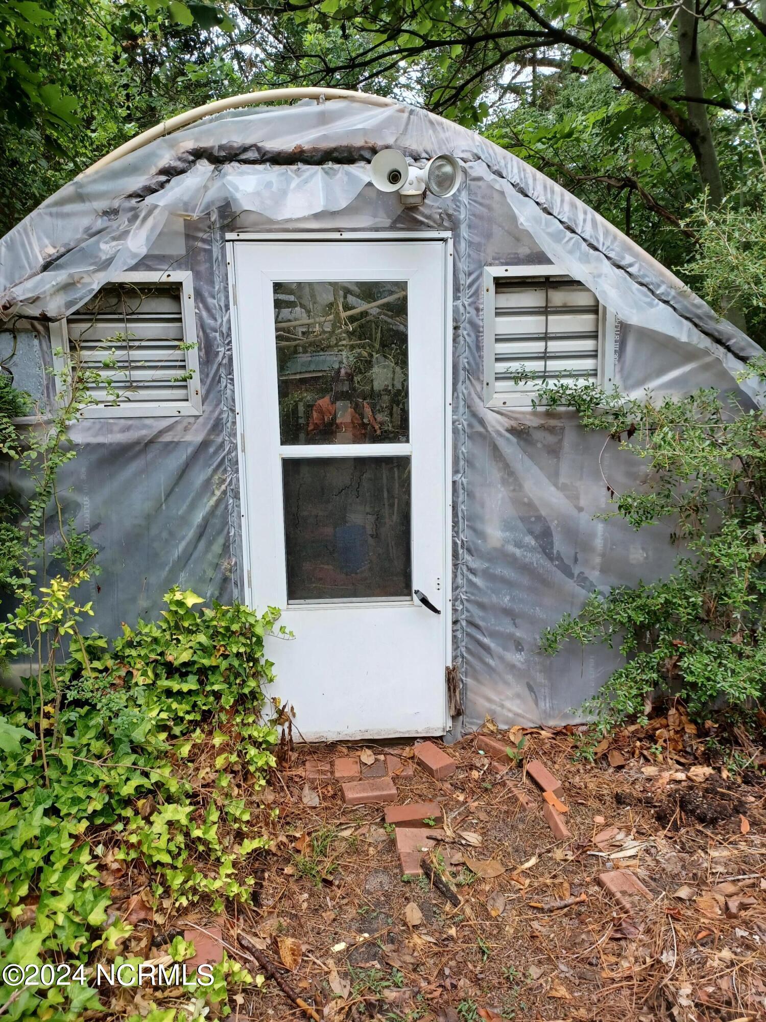115 Bill Stroud Road Kinston, NC 28504 - Photo 25 of 26 Greenhouse