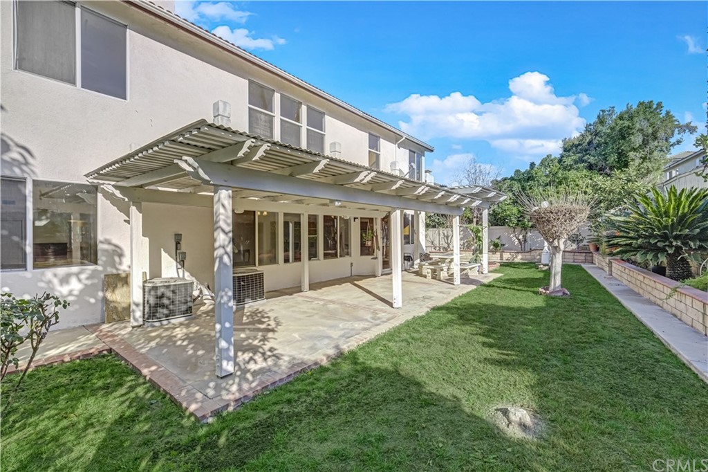 19366 Fortune Place Rowland Heights, CA 91748 - Photo 26 of 32 a view of a house with a yard and sitting area