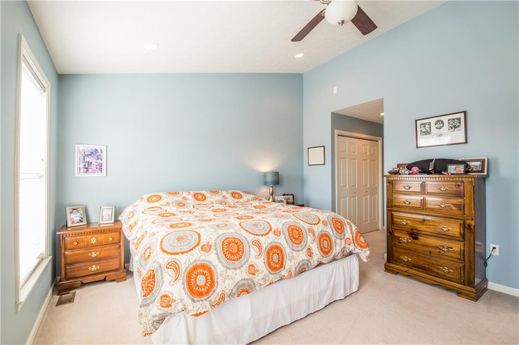 5009 Venice Road Pittsburgh, PA 15209 - Photo 13 of 25 Bright master bedroom with cathedral ceiling and ceiling fan.