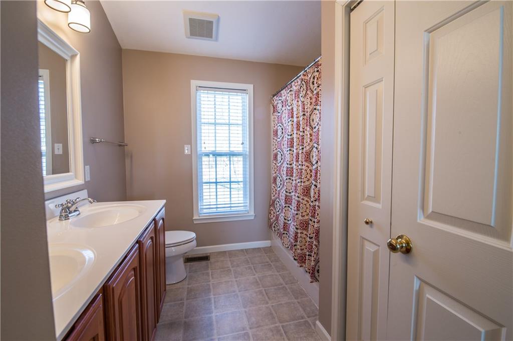 5009 Venice Road Pittsburgh, PA 15209 - Photo 16 of 25 Oversized tub in the master bath along with dual sinks and linen closet.