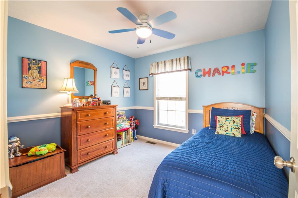 5009 Venice Road Pittsburgh, PA 15209 - Photo 17 of 25 Bedroom one with ceiling fan and chair rail.
