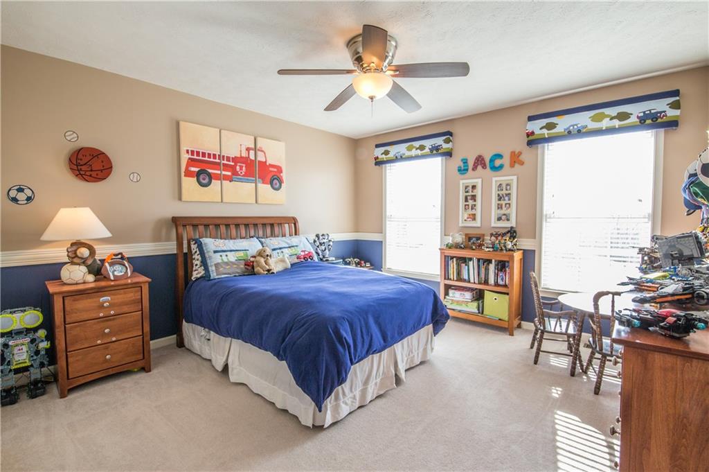 5009 Venice Road Pittsburgh, PA 15209 - Photo 21 of 25 Bedroom three with ceiling fan and chair rail.