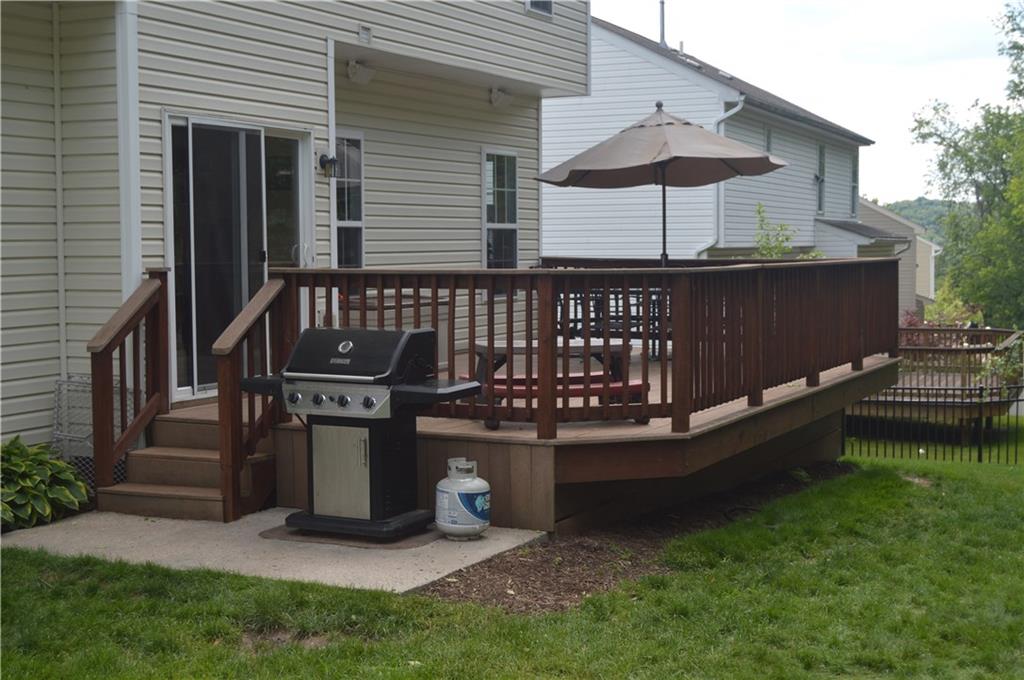 5009 Venice Road Pittsburgh, PA 15209 - Photo 23 of 25 Trex deck overlooking beautiful back yard landscaping.