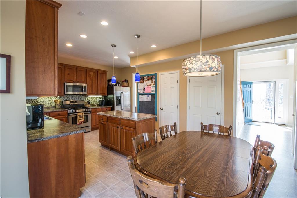5009 Venice Road Pittsburgh, PA 15209 - Photo 4 of 25 Beautiful kitchen with 9 foot ceilings, island, pantry, recessed lighting, and stainless steel appliances.